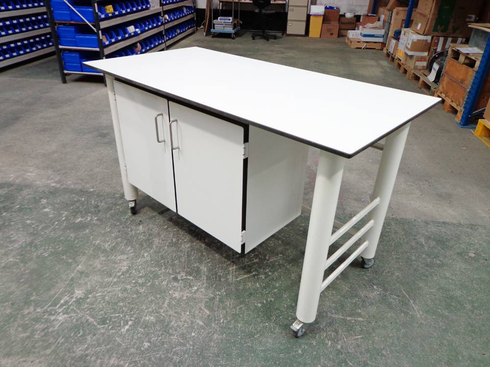 Proprietary Mobile Laboratory Bench and Fixed Double Base Unit with White Trespa Worktop.